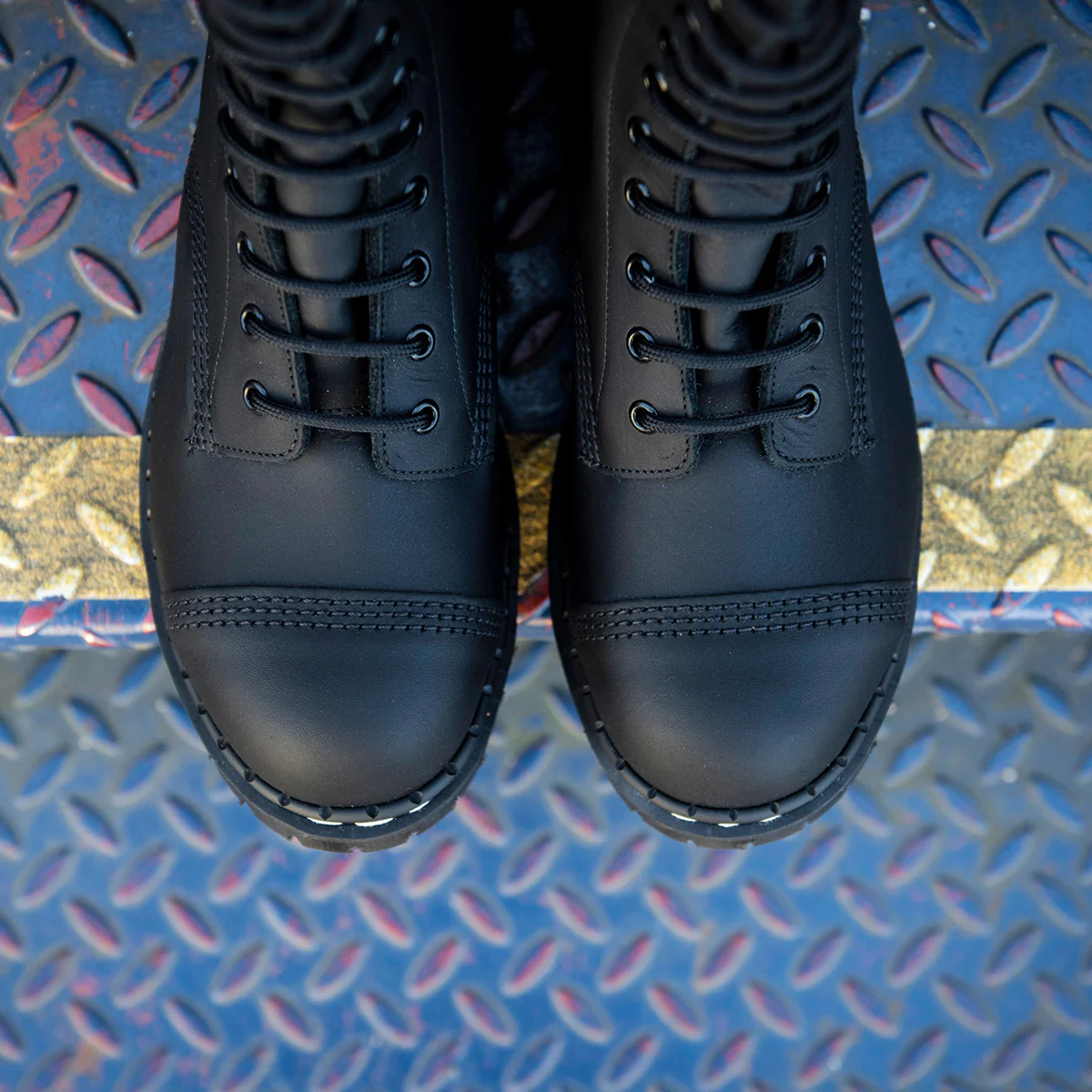 1930-black-greasy-10-eye-steel-toe-capped-derby-boot-6.webp Black Greasy 10 Eye Steel Toe Capped Derby Boot